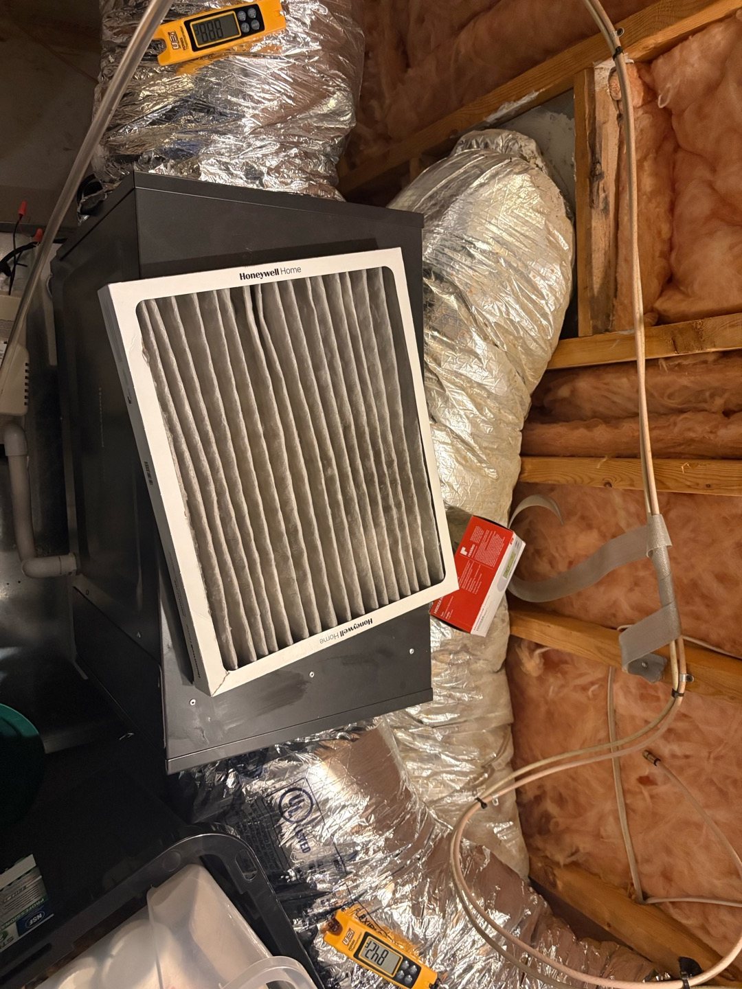A deep pleated filter in its own cabinet in a Georgia attic, with far more filter surface than a thin 1-inch filter