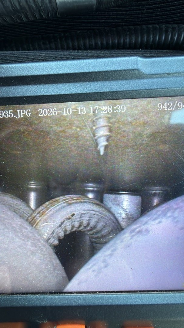 Inspection camera image of a gas furnace's heat exchanger passages during a fall heating tune-up