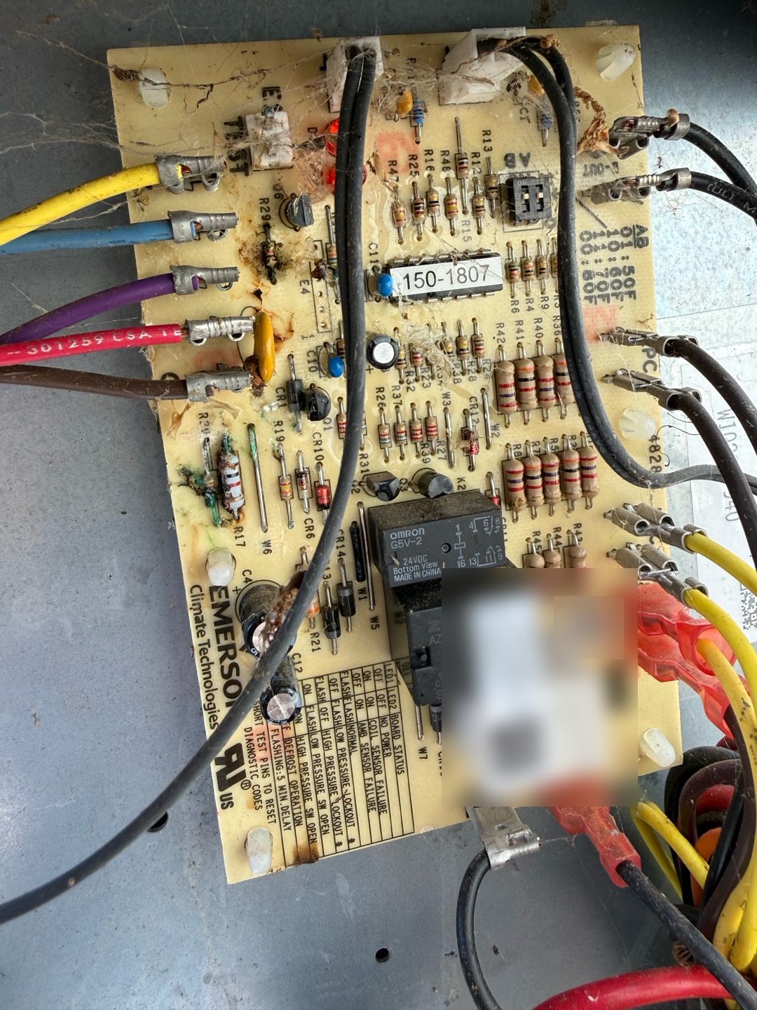 Heat pump defrost control board inside an outdoor unit, the part that tells a heat pump when to melt frost off its coil in cold weather